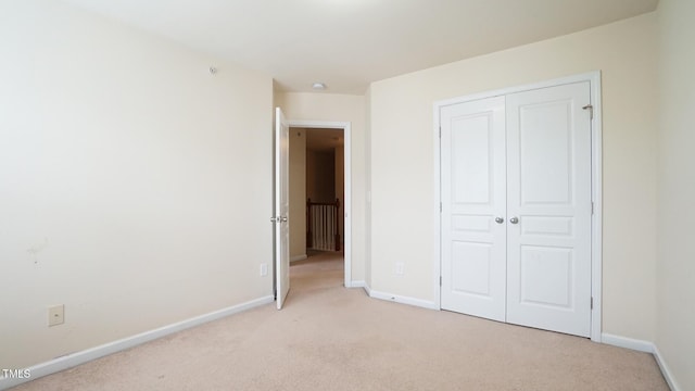 5916 Longeria Ct, Raleigh, NC 27612 - unfurnished bedroom with light colored carpet and a closet