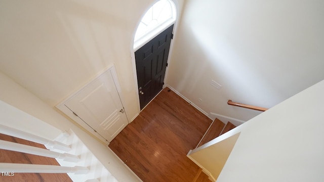 5916 Longeria Ct, Raleigh, NC 27612 - stairway with wood finished floors and baseboards