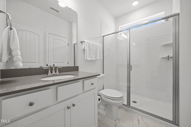 1600 Sandy Prairie Dr, Wendell, NC 27591 - bathroom featuring vanity, a shower stall, marble finish flooring, and recessed lighting