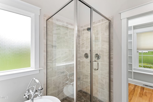 532 Joe Collins Rd, Lillington, NC 27546 - bathroom featuring a shower stall and wood finished floors