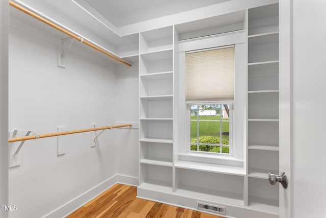 532 Joe Collins Rd, Lillington, NC 27546 - walk in closet featuring wood finished floors