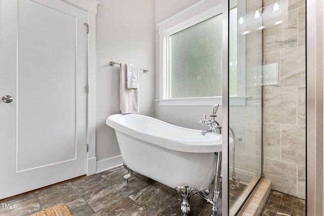 532 Joe Collins Rd, Lillington, NC 27546 - full bath featuring a soaking tub, a stall shower, and stone finish floors