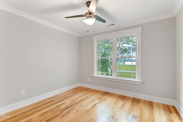 532 Joe Collins Rd, Lillington, NC 27546 - spare room featuring crown molding, wood finished floors, and ceiling fan
