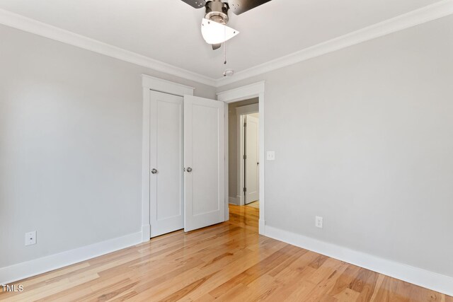 532 Joe Collins Rd, Lillington, NC 27546 - unfurnished bedroom featuring ornamental molding, wood finished floors, and a ceiling fan
