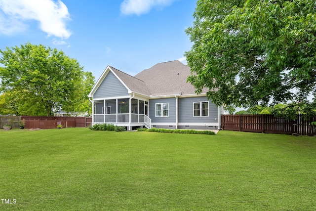 532 Joe Collins Rd, Lillington, NC 27546 - rear view of property featuring crawl space, a sunroom, a fenced backyard, and roof with shingles