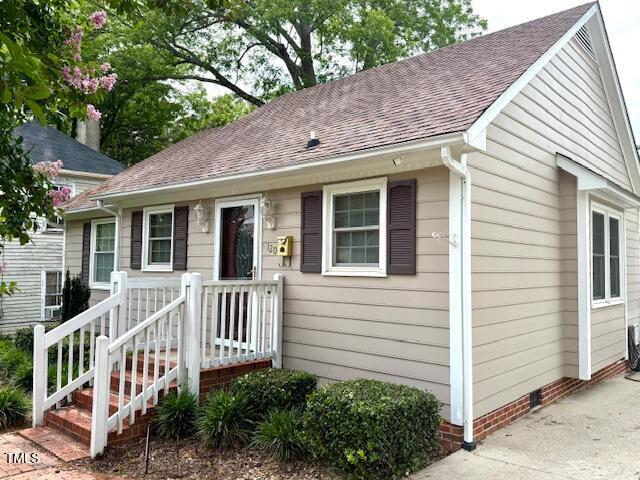 120 W Front St, Oxford, NC 27565 - view of front of property featuring roof with shingles