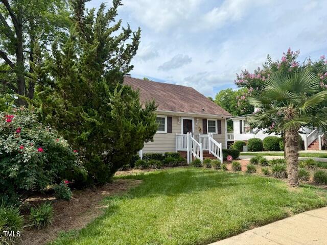 120 W Front St, Oxford, NC 27565 - view of front of home with a front lawn
