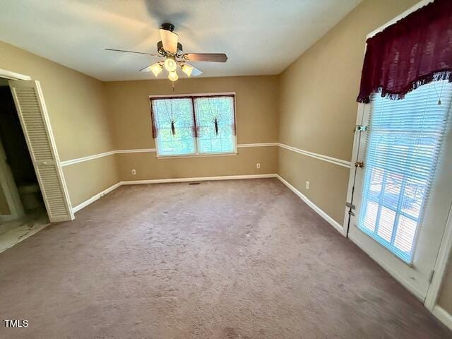 120 W Front St, Oxford, NC 27565 - carpeted empty room featuring a ceiling fan and baseboards