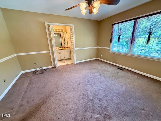 120 W Front St, Oxford, NC 27565 - carpeted spare room featuring ceiling fan and baseboards