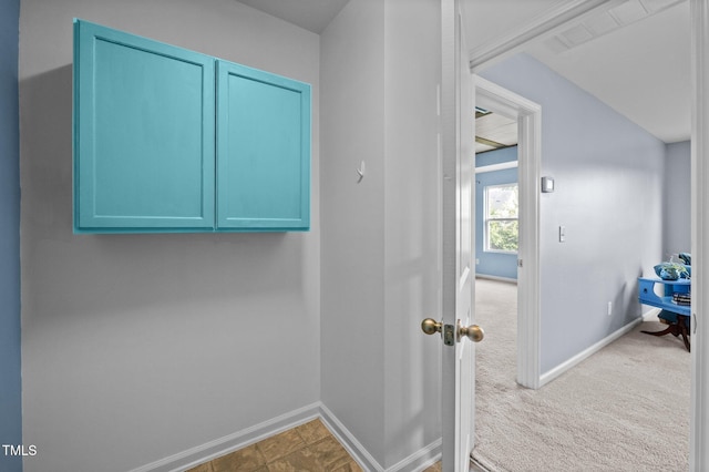 7 Faircroft Ct, Durham, NC 27703 - laundry room with baseboards and carpet floors