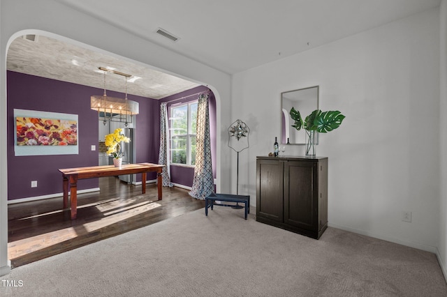 7 Faircroft Ct, Durham, NC 27703 - carpeted dining room with arched walkways