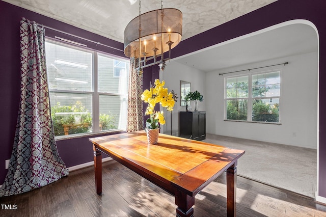 7 Faircroft Ct, Durham, NC 27703 - dining space with a chandelier and wood finished floors