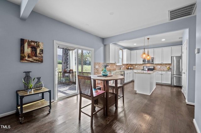 7 Faircroft Ct, Durham, NC 27703 - dining space featuring dark wood-type flooring and recessed lighting