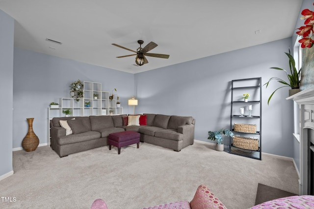 7 Faircroft Ct, Durham, NC 27703 - carpeted living room with a fireplace and a ceiling fan
