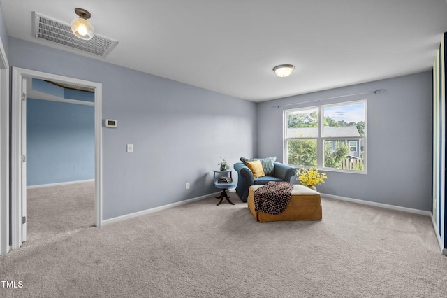 7 Faircroft Ct, Durham, NC 27703 - sitting room with carpet flooring and baseboards