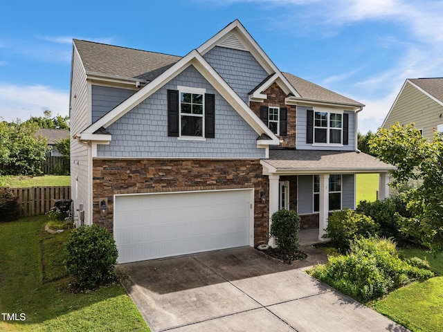 7 Faircroft Ct, Durham, NC 27703 - craftsman house featuring stone siding, concrete driveway, a garage, and a shingled roof
