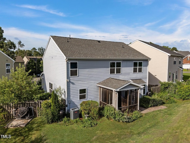 7 Faircroft Ct, Durham, NC 27703 - back of house featuring a sunroom and a shingled roof