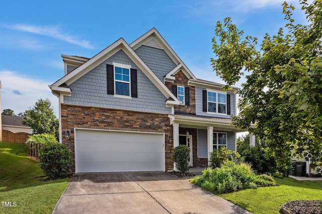 7 Faircroft Ct, Durham, NC 27703 - craftsman house featuring stone siding, concrete driveway, a garage, and a porch