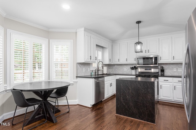 213 Brompton Ct, Burlington, NC 27215 - kitchen with stainless steel appliances, dark countertops, white cabinets, dark wood-style floors, and recessed lighting
