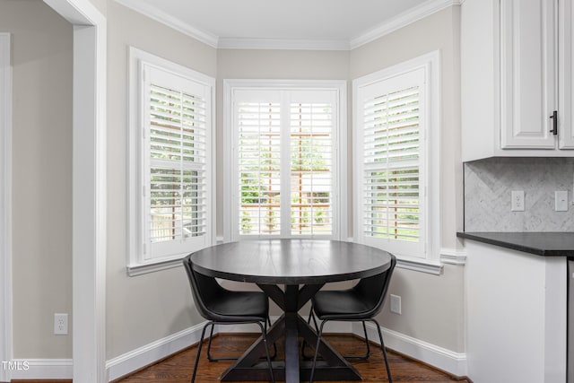 213 Brompton Ct, Burlington, NC 27215 - dining room featuring healthy amount of natural light, wood finished floors, and crown molding