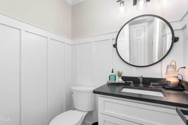 213 Brompton Ct, Burlington, NC 27215 - half bathroom with a decorative wall, vanity, wainscoting, and ornamental molding