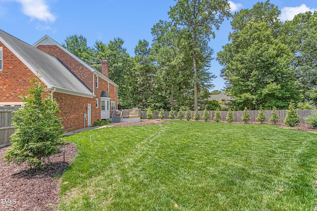 213 Brompton Ct, Burlington, NC 27215 - fenced backyard featuring a deck
