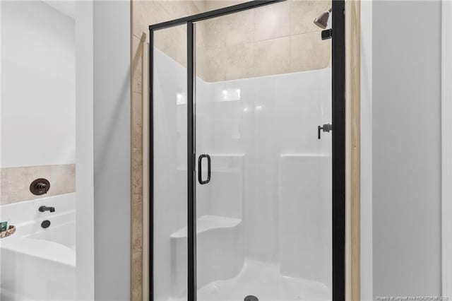 6939 Running Fox Rd, Hope Mills, NC 28348 - bathroom with a stall shower and a garden tub