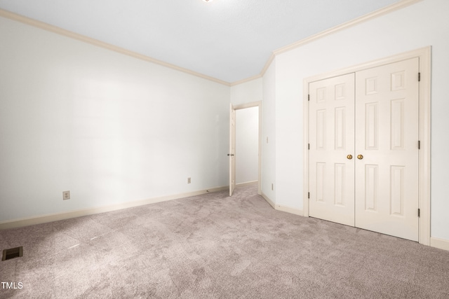 101 Turnberry Ln, Cary, NC 27511 - unfurnished bedroom featuring crown molding, carpet, and a closet
