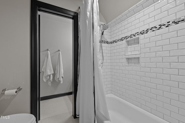 901 Tamaras Cir, Wake Forest, NC 27587 - full bathroom featuring shower / bath combo and tile patterned flooring