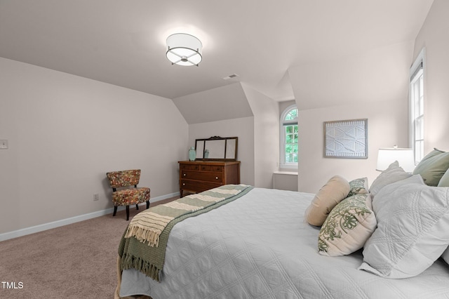 901 Tamaras Cir, Wake Forest, NC 27587 - carpeted bedroom featuring baseboards and lofted ceiling