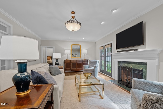 901 Tamaras Cir, Wake Forest, NC 27587 - living room with wood finished floors, a high end fireplace, crown molding, and recessed lighting