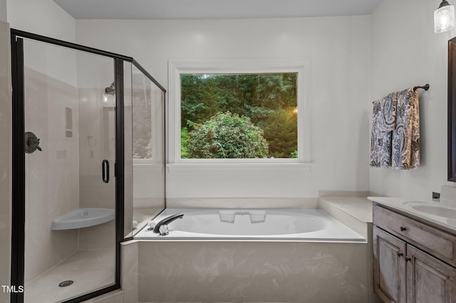 901 Tamaras Cir, Wake Forest, NC 27587 - full bathroom with vanity, a garden tub, and a stall shower