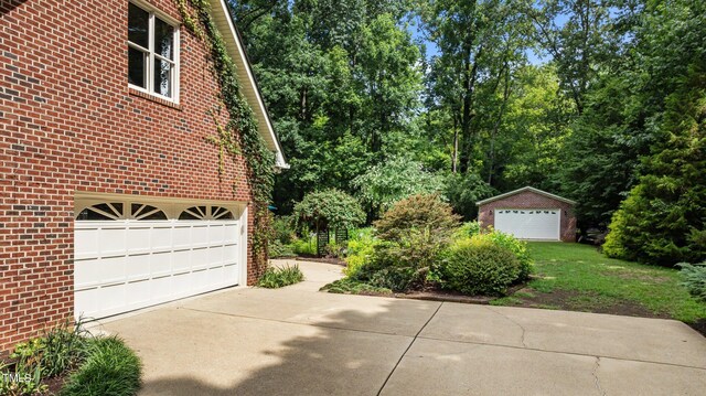 901 Tamaras Cir, Wake Forest, NC 27587 - garage featuring driveway