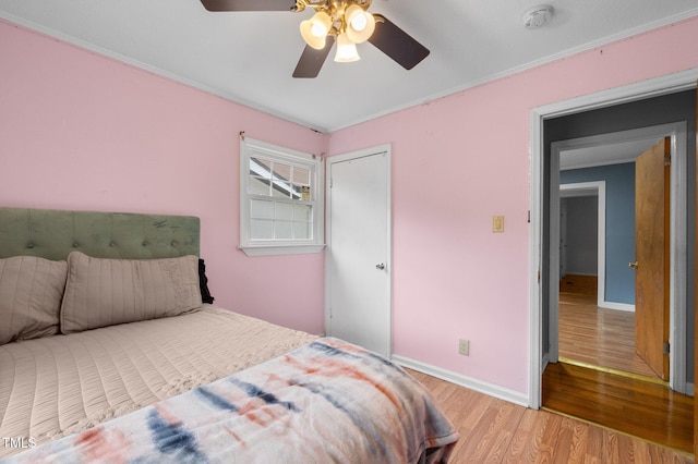110 Starlite Dr, Carrboro, NC 27510 - bedroom featuring wood finished floors, ornamental molding, and a ceiling fan