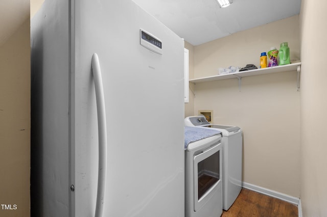 110 Starlite Dr, Carrboro, NC 27510 - laundry area with washing machine and dryer and wood finished floors