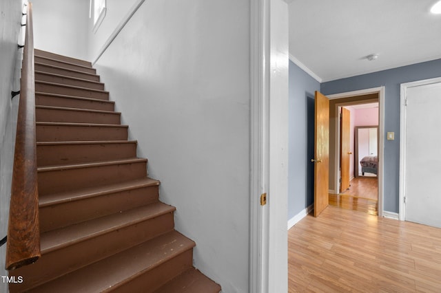 110 Starlite Dr, Carrboro, NC 27510 - staircase featuring wood finished floors and ornamental molding