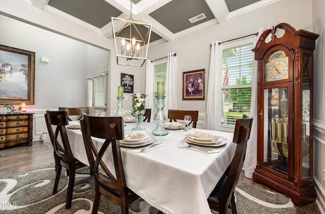 71 Sanibel St, Clayton, NC 27520 - dining space with wood finished floors, coffered ceiling, a chandelier, beamed ceiling, and crown molding