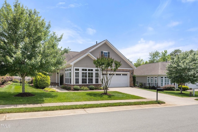 102 Mikaila Dr, Gibsonville, NC 27249 - view of front facade with driveway and an attached garage