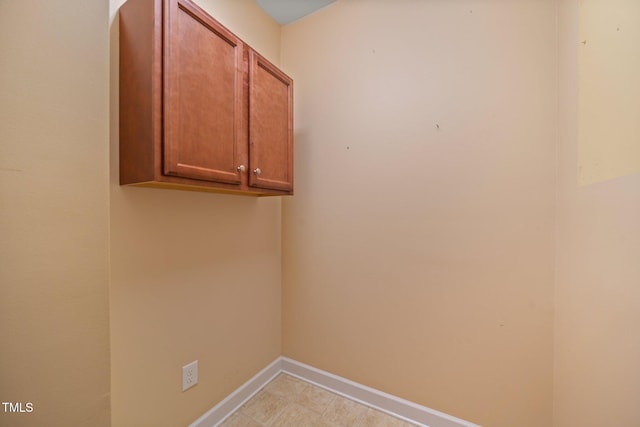 102 Mikaila Dr, Gibsonville, NC 27249 - laundry area with baseboards and arched walkways