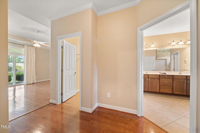 102 Mikaila Dr, Gibsonville, NC 27249 - hall with crown molding and light wood-style floors