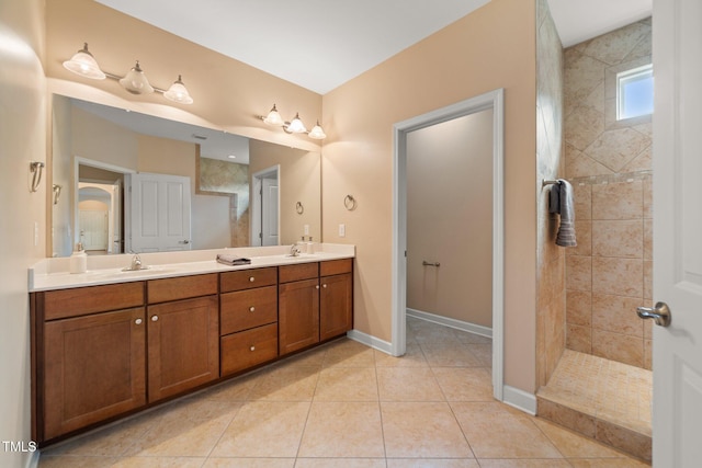 102 Mikaila Dr, Gibsonville, NC 27249 - bathroom with double vanity, a walk in shower, and tile patterned flooring