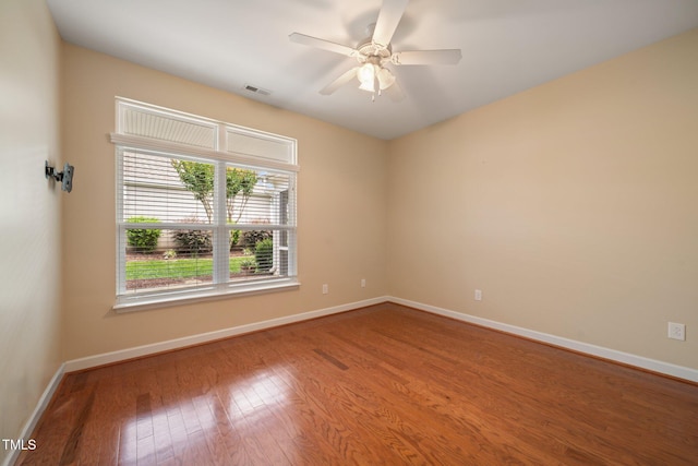 102 Mikaila Dr, Gibsonville, NC 27249 - empty room featuring ceiling fan and wood finished floors
