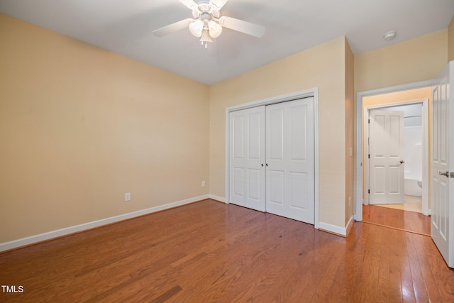 102 Mikaila Dr, Gibsonville, NC 27249 - unfurnished bedroom featuring wood finished floors, a closet, and ceiling fan