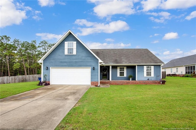 420 Gibson Dr, Raeford, NC 28376 - traditional home featuring driveway, a garage, and covered porch