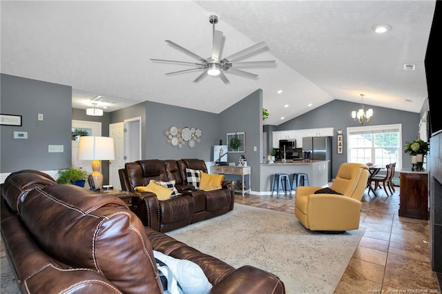 420 Gibson Dr, Raeford, NC 28376 - living area with vaulted ceiling, a chandelier, ceiling fan, recessed lighting, and stone finish flooring