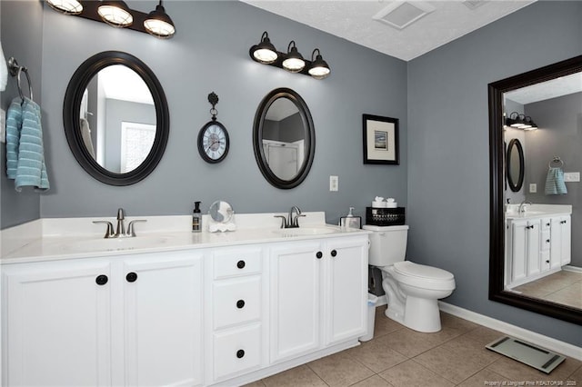 420 Gibson Dr, Raeford, NC 28376 - full bath with double vanity and tile patterned flooring