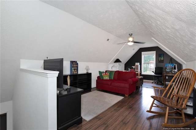 420 Gibson Dr, Raeford, NC 28376 - living room featuring dark wood-type flooring, vaulted ceiling, an office area, and a textured ceiling