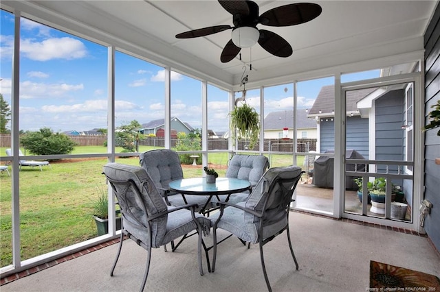 420 Gibson Dr, Raeford, NC 28376 - sunroom with a ceiling fan, a residential view, and outdoor dining space