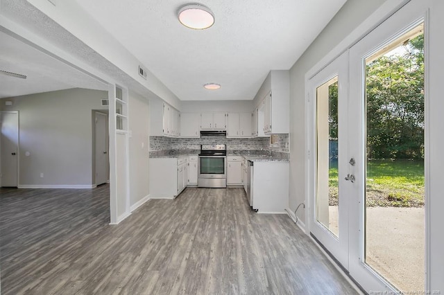 2304 Electra Rd, Fayetteville, NC 28304 - kitchen with appliances with stainless steel finishes, wood finished floors, backsplash, white cabinetry, and open floor plan