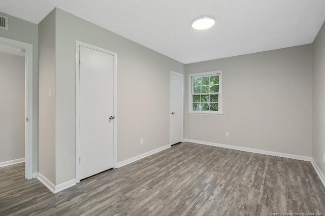 2304 Electra Rd, Fayetteville, NC 28304 - unfurnished bedroom featuring wood finished floors